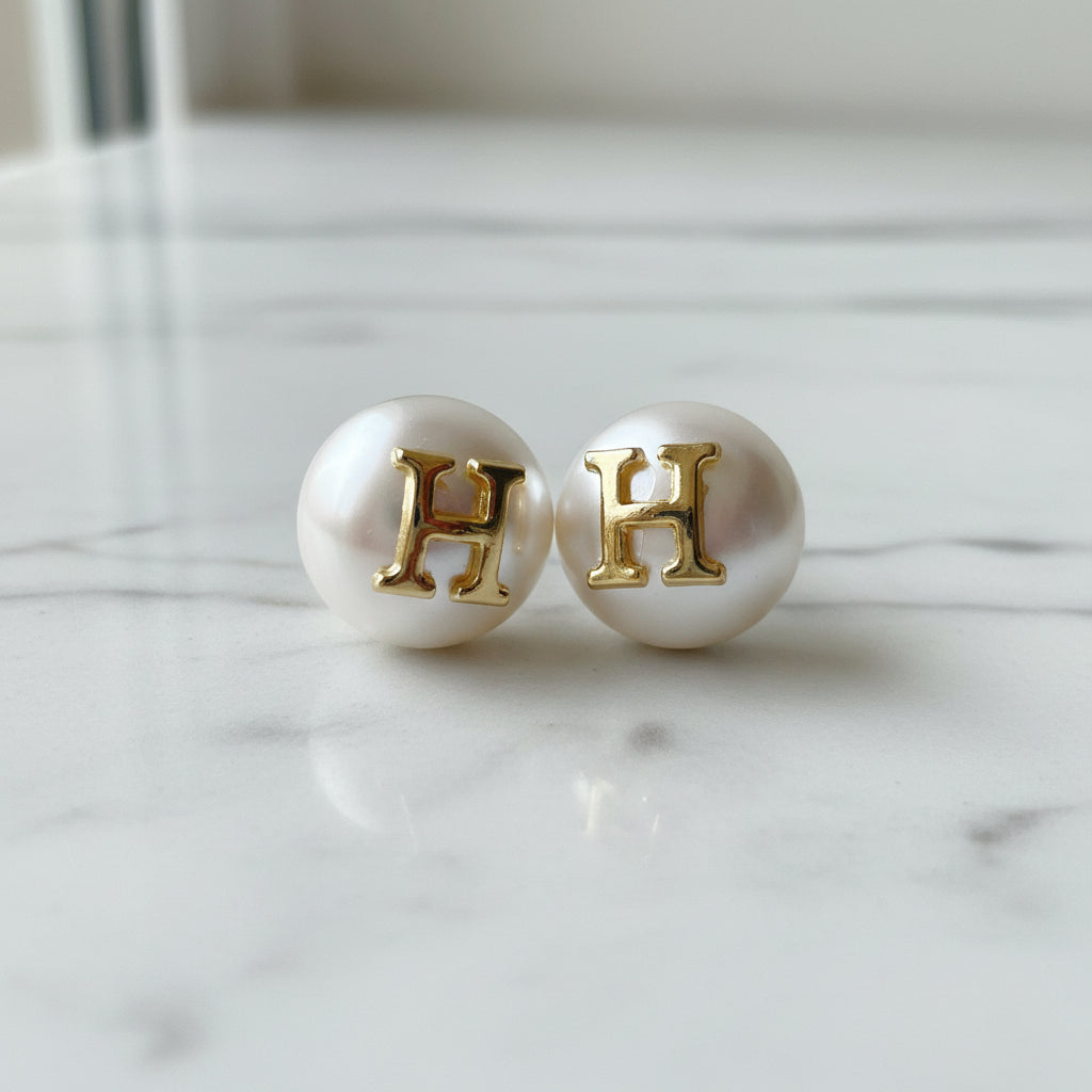 Golden Monogram Pearl Studs – H Edition
