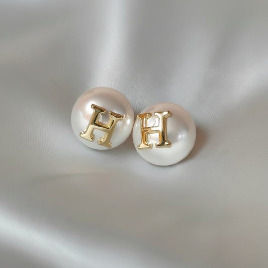 Golden Monogram Pearl Studs – H Edition